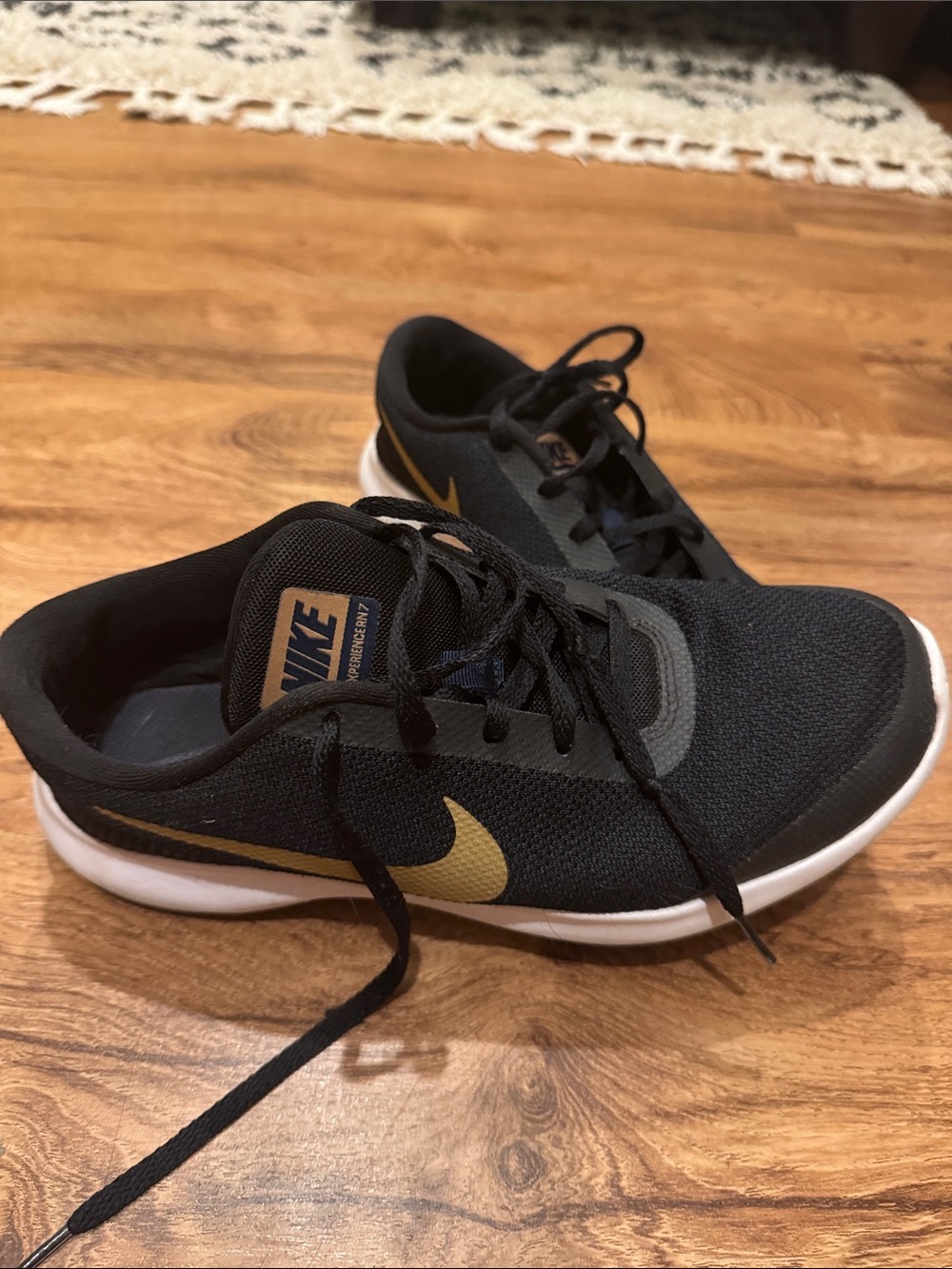 Nike Black and Gold Flex Experience Trainers